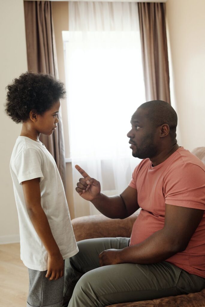 father talking to his son